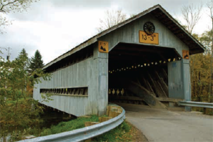 Ohio's covered bridges, like this one in Ashtabula County, attract tourists to an area where rural businesses and residents do not have reliable internet access.